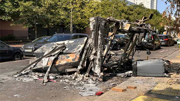 Youths clash with police near Paris after teenager shot dead in traffic stop