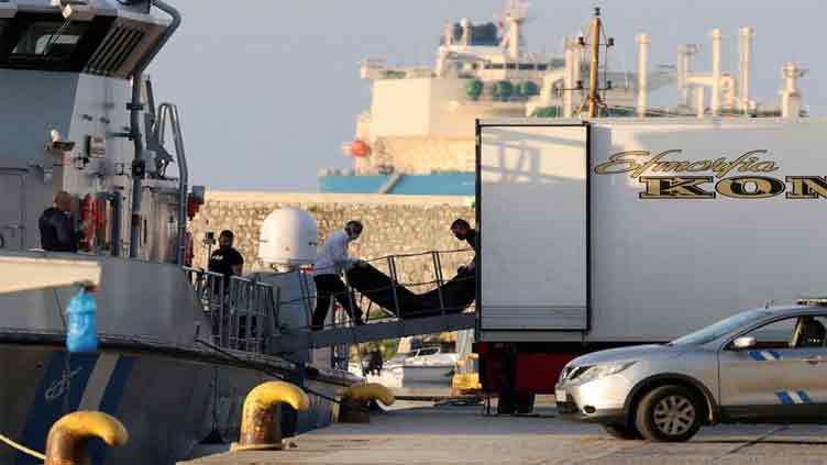 Greece migrant tragedy: coastguard rope capsized boat, survivor accounts say