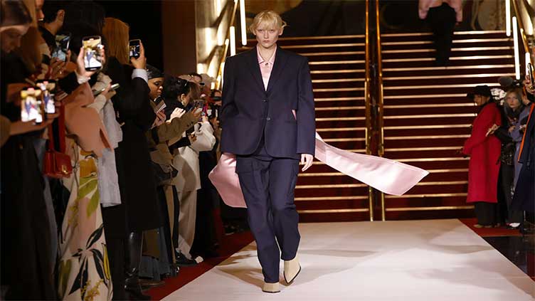 Fashion designer uses Paris show to display life in Ukraine