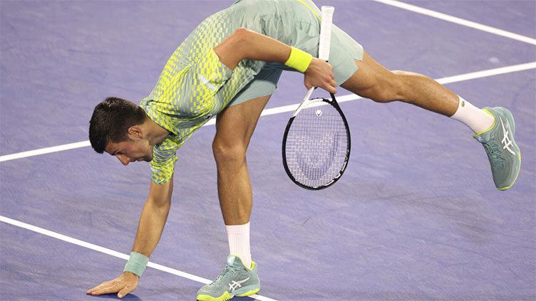 Tennis: Tennis-Djokovic powers past Griekspoor into Dubai quarter-finals