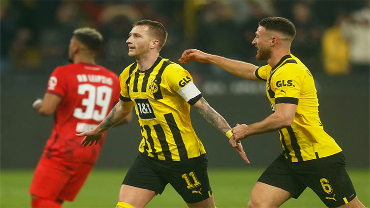 Efficient Dortmund edge past Leipzig 2-1 to move into top spot