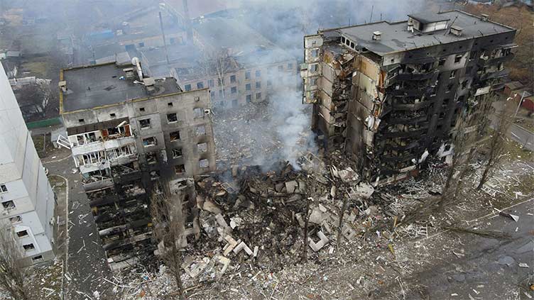 Photos of bombed Kyiv apartment block show building before and after restoration, do not show war in Ukraine is staged