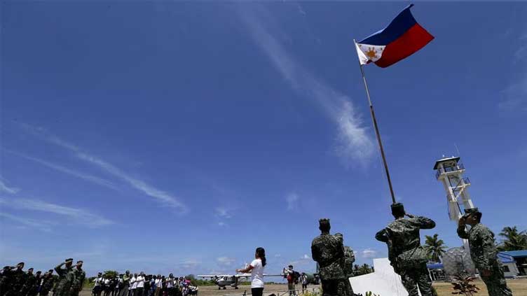  Philippines says Chinese navy ship spotted near disputed island