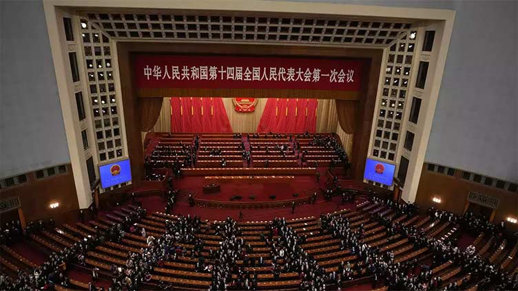 China sets modest growth target of about 5% as parliament opens