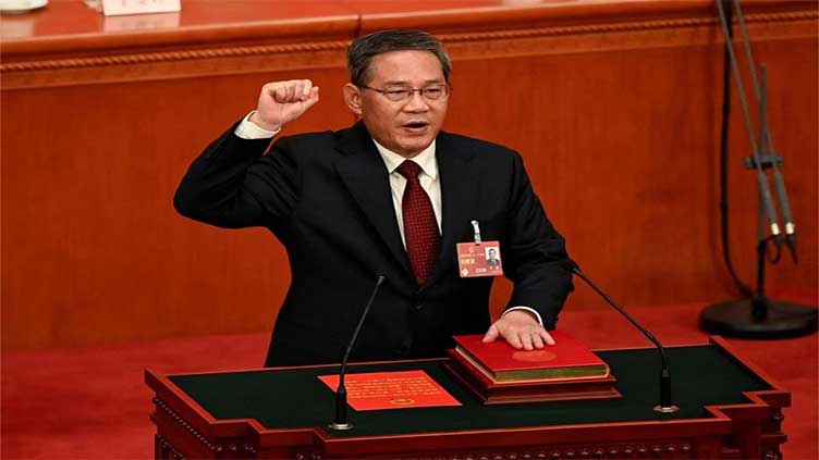 Li Qiang becomes China's premier, tasked with reviving economy