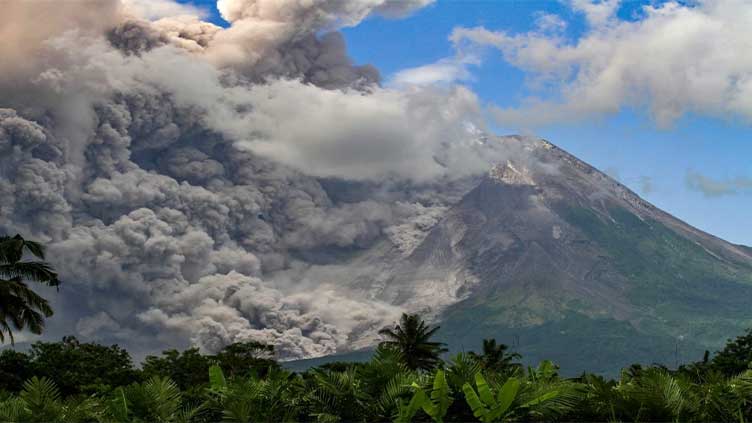 Indonesia's Merapi volcano erupts, spews hot cloud