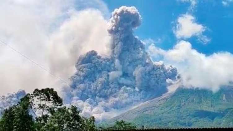 Indonesia's Merapi volcano erupts, spews hot cloud