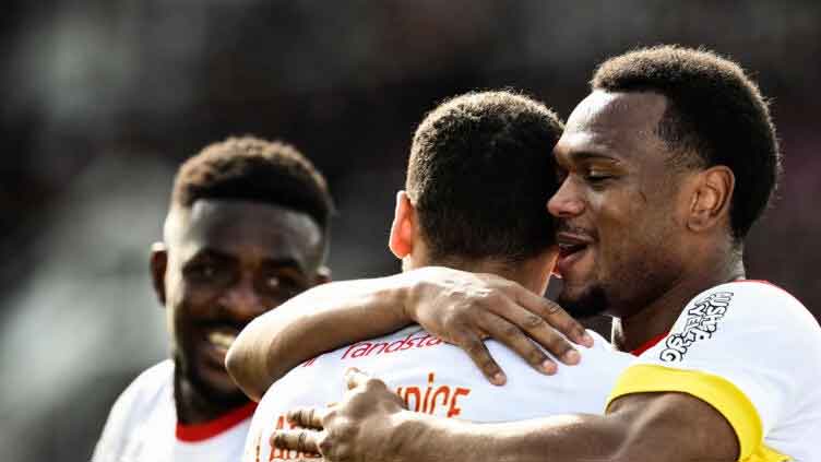 Openda's five-minute hat-trick lifts Lens to third