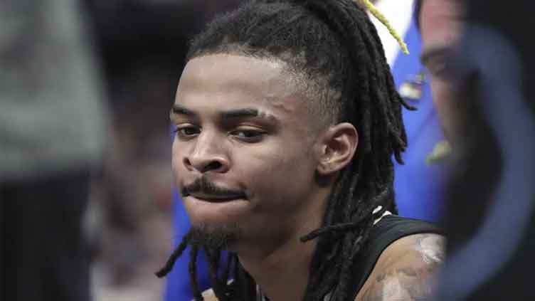 NBA suspends Ja Morant 8 games for video showing gun in club