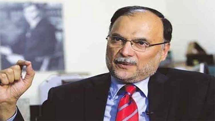 Imran spreading chaos, claims Ahsan Iqbal