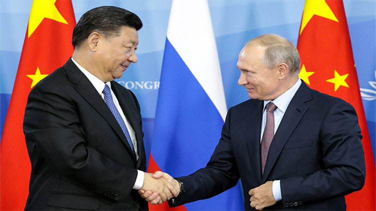 Putin to welcome China's Xi to Moscow at critical moment