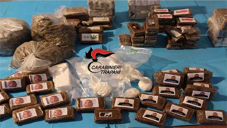 Italy police seize drug haul decorated with Mafia mugshots