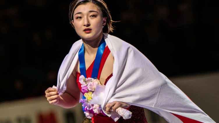 Japan's Sakamoto survives wobble to retain world skating title