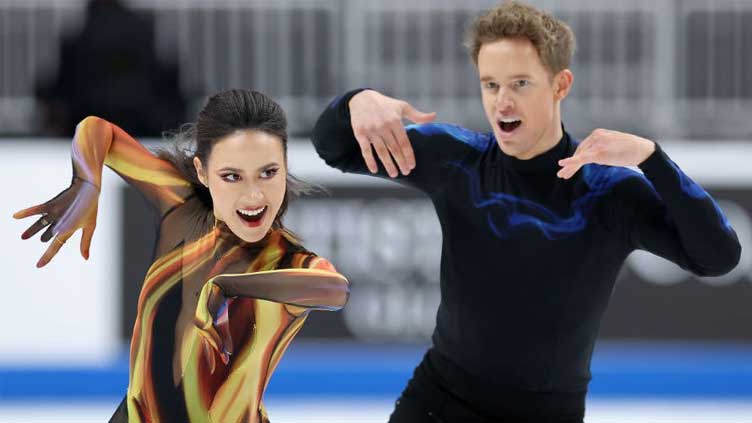 Chock, Evans claim ice dance world gold despite slip