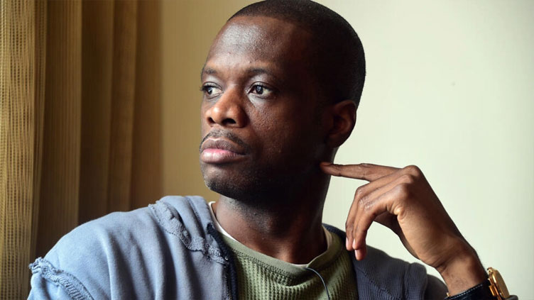 Former Fugees member faces trial in conspiracy case