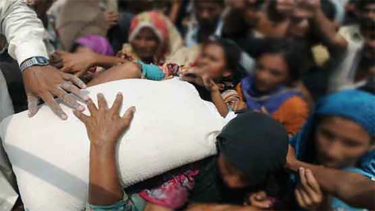 Police baton-charge leaves woman dead, 43 others injured at flour distribution centre