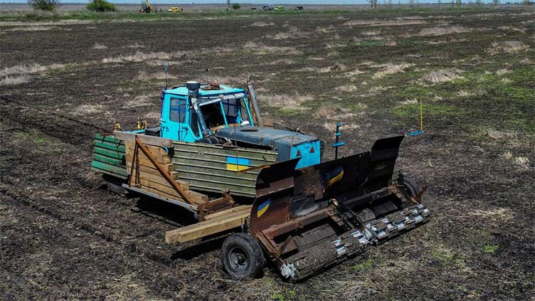 Ukrainian farmer comes up with novel way to demine his fields