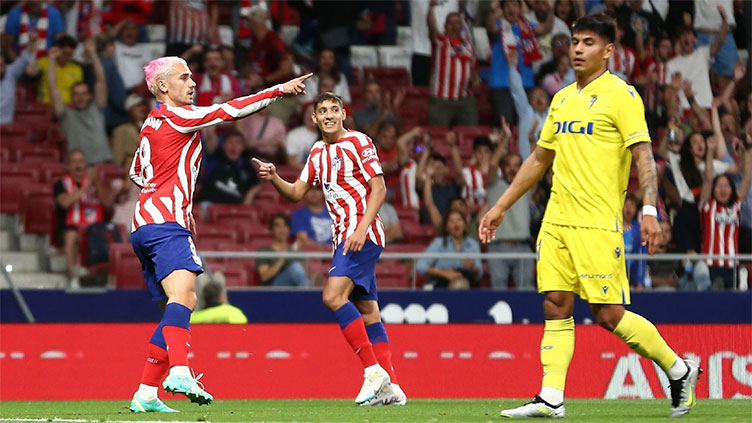 Atletico thrash Cadiz 5-1 to leapfrog Real Madrid into second