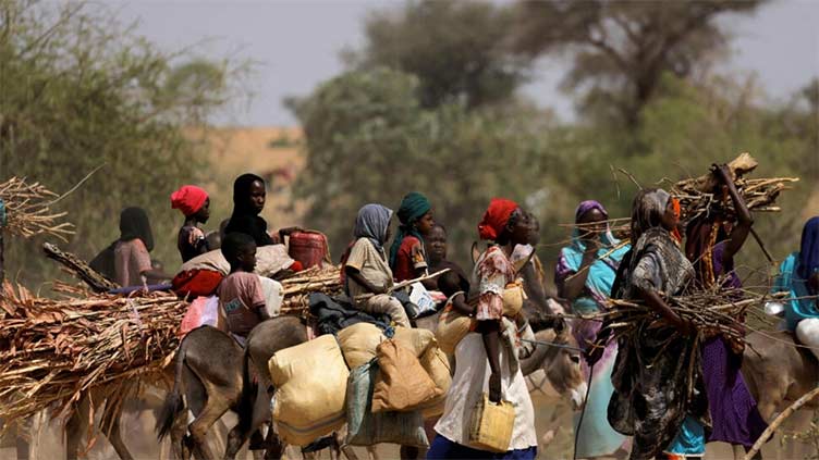 Around 200,000 people have fled Sudan in month of fighting, UN says