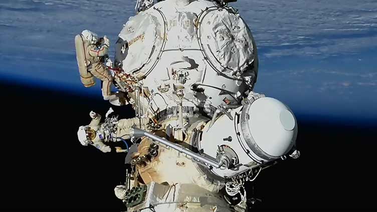 Cosmonauts deploy radiator and complete spacewalk