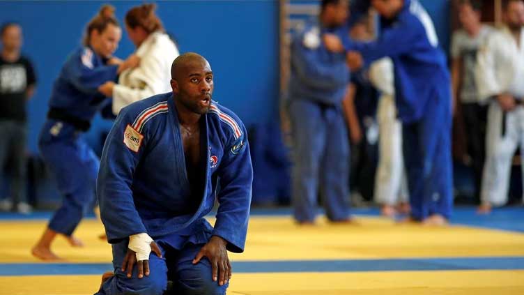 France's Riner collects record-extending 11th world title