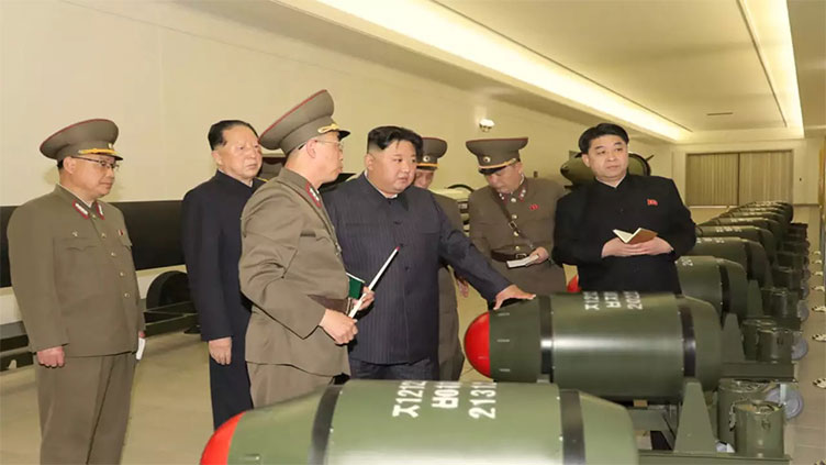 North Korea's Kim Jong Un inspects military satellite station -KCNA