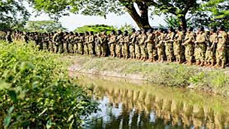 El Salvador forces surround town in north after police killing