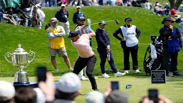 LIV Golf's DeChambeau grabs PGA Championship clubhouse lead