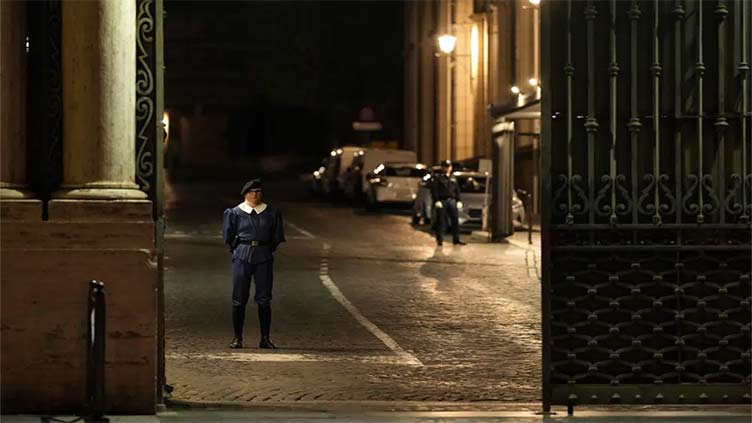 Car rushes Vatican gate, is fired on by gendarmes; driver apprehended after reaching courtyard