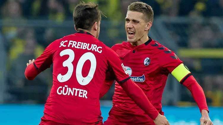 Freiburg keep Champions League hopes alive with 2-0 win over Wolfsburg