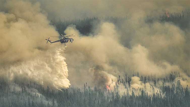 Alberta on high alert for wildfire upsurge over scorching holiday weekend