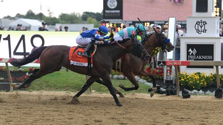 Baffert's National Treasure wins Preakness Stakes