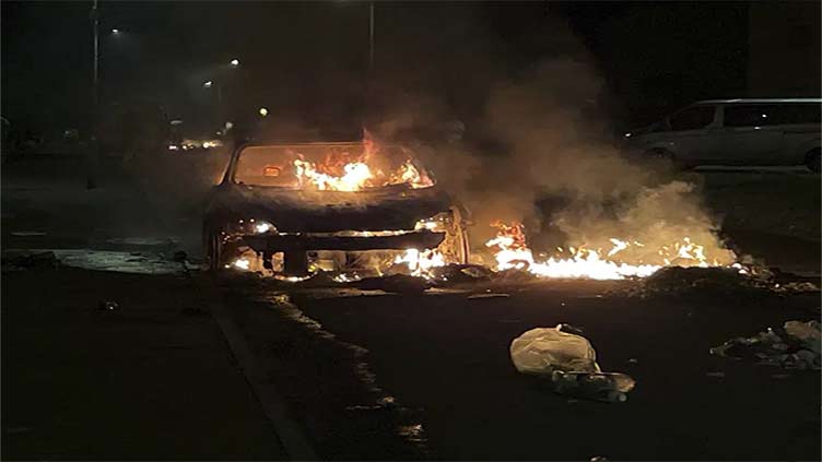 Cars set on fire in Welsh capital as police face 'large scale disorder'