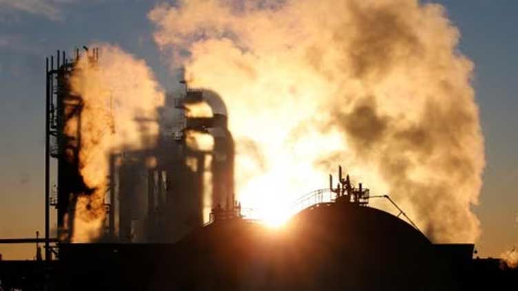 Japan manufacturers' mood turns positive as economy recovers