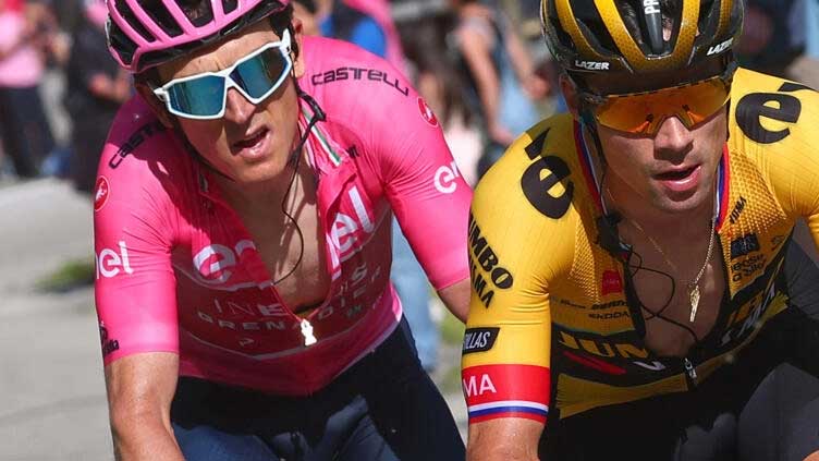 Birthday boy Thomas resists Roglic assault to stay in Giro pink