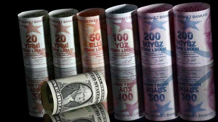 Turkish lira slips as Erdogan secures victory