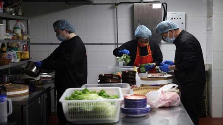 China's services activity picks up slightly