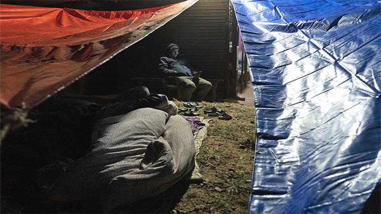 Thousands sleep under sky in Nepal after earthquake kills at least 157