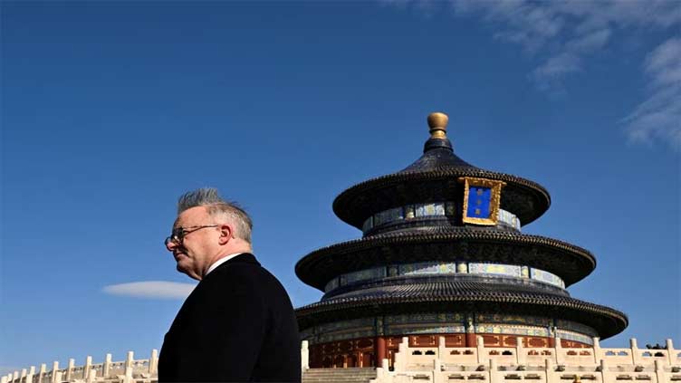 Australia's Albanese retraces historic Beijing walk on visit to mend ties