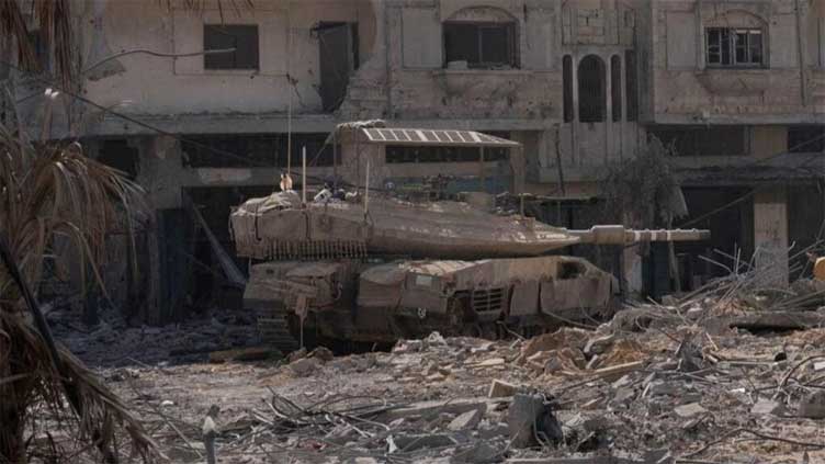 Tanks poised around Gaza City; Netanyahu says Israel to run security after war