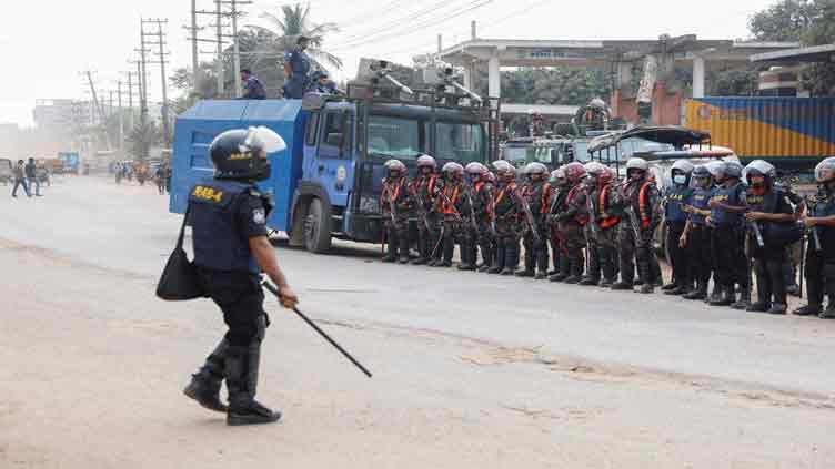 One killed as Bangladesh garment workers clash with police despite pay raise 