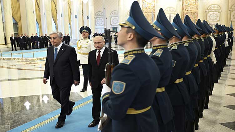 Putin visits Kazakhstan, part of his efforts to cement ties with ex-Soviet neighbors