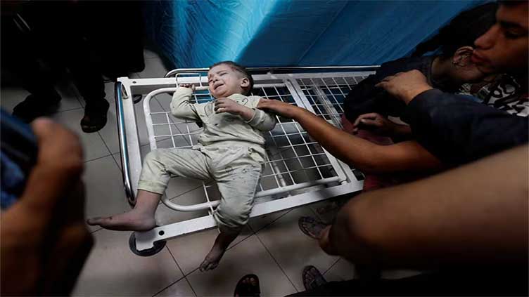 Israel offers Gaza hospital evacuation for babies but fighting rages on