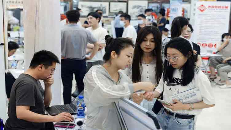 China youth unemployment: Chinese graduates hold off career dreams, take temporary government jobs