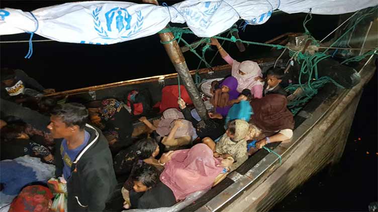 About 100 Rohingya arrive by boat in Indonesia's Aceh