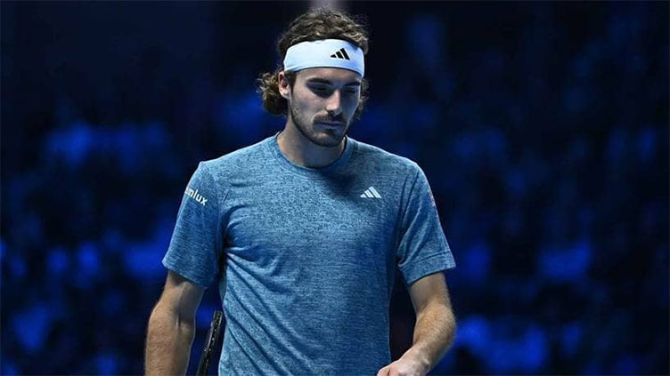 Tsitsipas quits ATP Finals with back injury