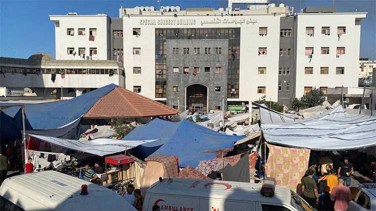 Israel raids Gaza's Al Shifa Hospital, urges Hamas to surrender