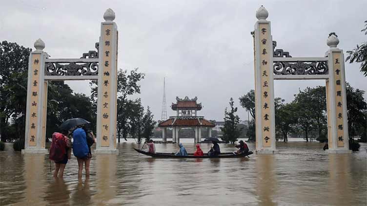 Thousands of homes underwater after floods hit Vietnam