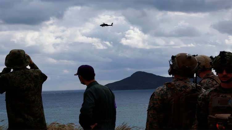 Japanese helicopters train to repel invaders amid nationwide military drills