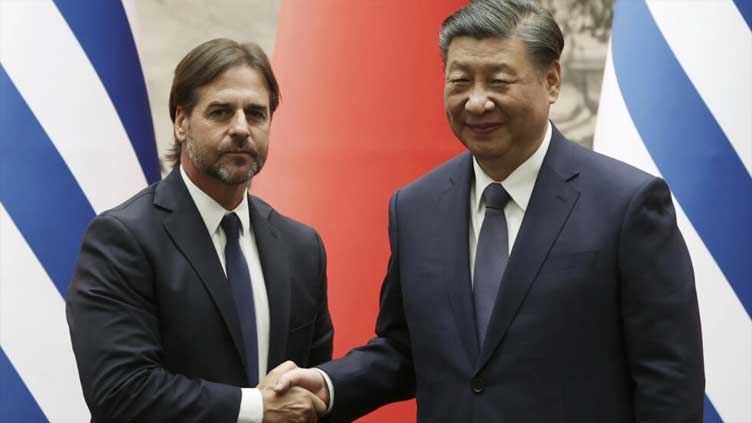 China and Uruguay upgrade ties as leaders meet in Beijing